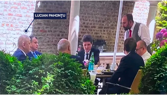 Lucian Pahontu la masa cu Nicusor Dan 800x450 1 png