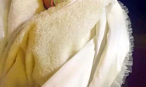 Micuţa Eva a fost foarte cuminte pe tot parcursul ceremoniei de creştinare  jpeg