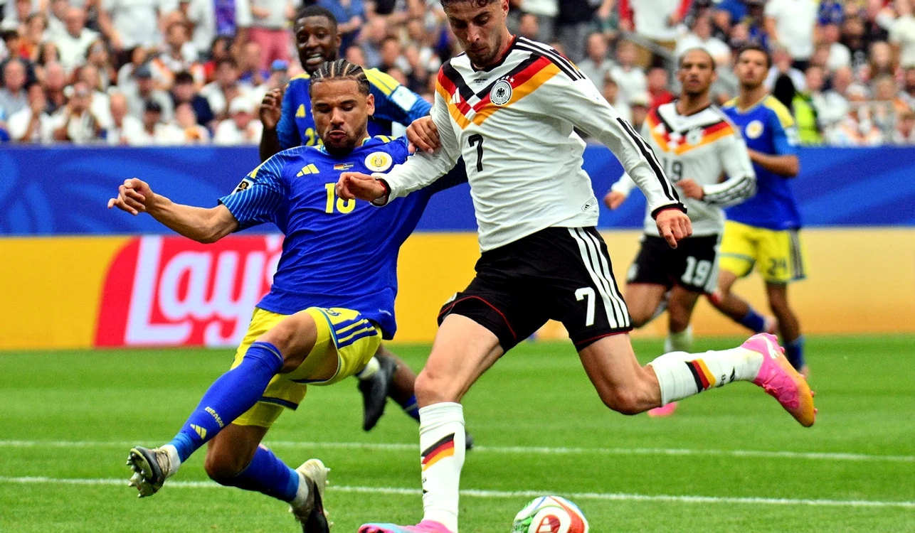 Kai Havertz (dreapta), autorul unei „duble” în victoria Germaniei în fața Curaçao (FOTO: EPA)