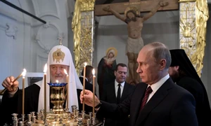 Putin la slujba de Craciun jfif