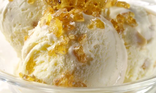 Bowl of vanilla ice cream with pralin jpeg