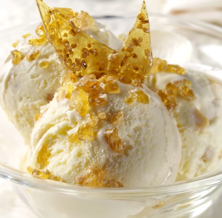 Bowl of vanilla ice cream with pralin jpeg