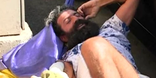 Protestatarul legitimat de jandarmi lângă sediul de campanie al lui Traian Băsescu