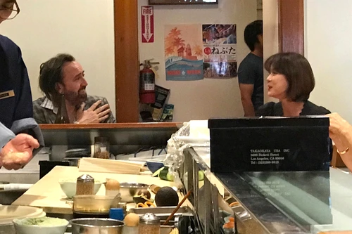 *EXCLUSIVE* Nicolas Cage gets flirty at 'Sushi Gen' jpeg