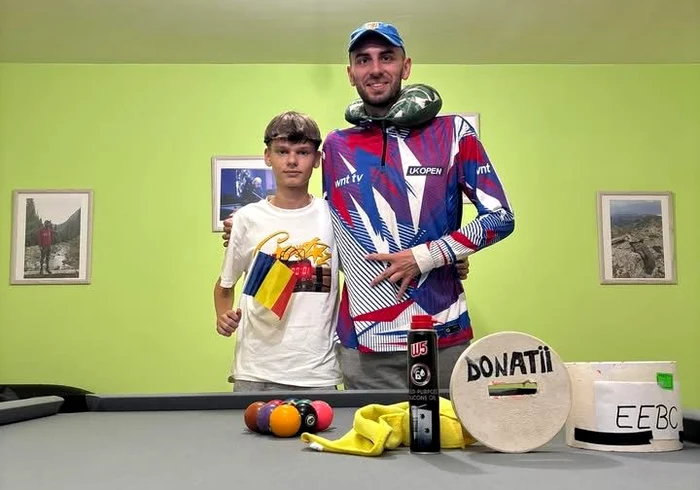 Evan, alături de antrenorul său, Cristian Surdea