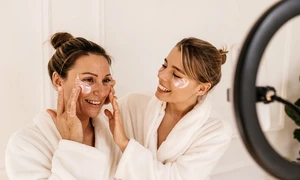 beautiful caucasian girls bathrobes struggle with bruises dark circles eyes with patches skin care health concept jpg