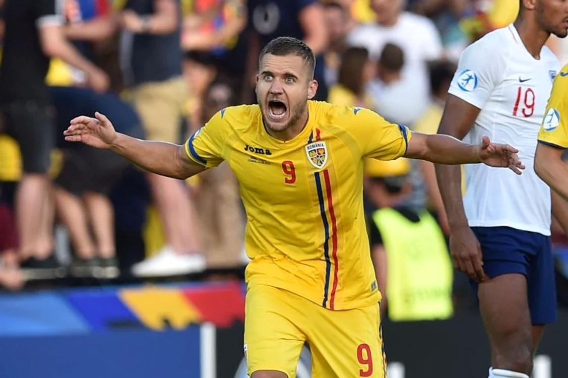 
    George Pușcaș, după marcarea primului gol cu Anglia de la Euro 2019Foto: Guliver/ GettyImages  