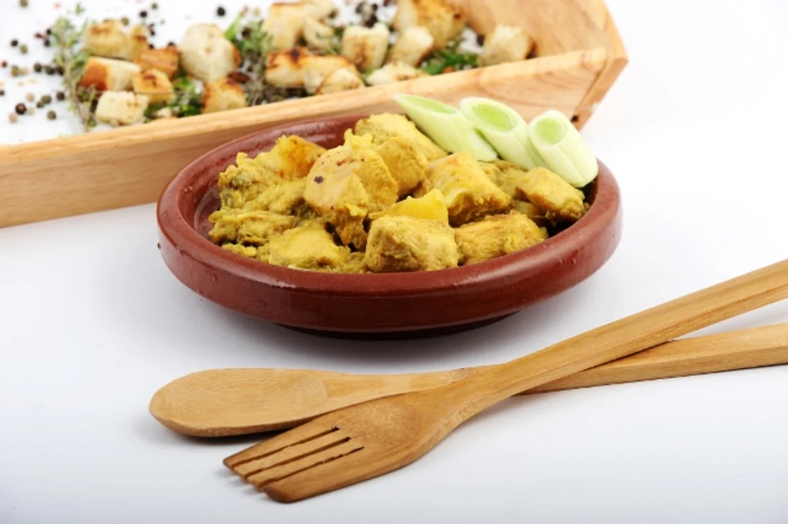 Piept de pui în sos curry