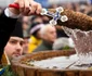 Tradiţii şi superstiţii de Bobotează De ce se îmbulzesc românii la butoaiele cu Agheasma Mare