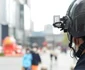 CASCA DE POLITIE CU DETECTOR DE TEMPERATURA CORPORALA coronavirus în China FOTO Mediafax / Hepta / Zuma Press