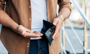close up hands holding wallet coins (5) jpg