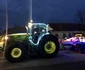 Moş Crăciun a venit cu un tractorul încărcat cu cadouri la copiii din comuna Berlişte