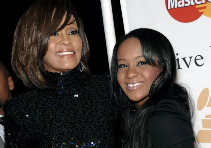 Whitney Houston şi fiica sa, Bobbi Kristina Brown, pe 12 februarie 2011 FOTO AP