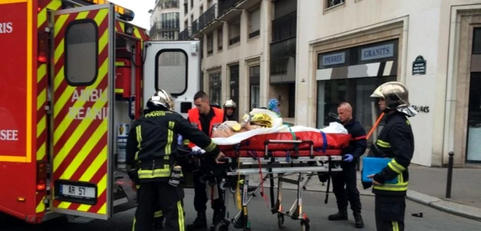 Sediul ziarului satiric Charlie Hebdo din Paris a fost vizat miercuri de un atac soldat cu moartea a 11 persoane şi rănirea altor 5.Foto: AFP