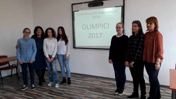 olimpici limba romana