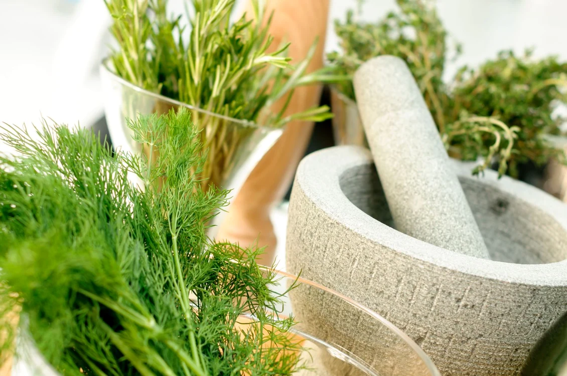 43818668   fresh herbs and mortar for spices clode up jpeg