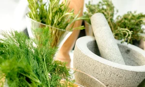 43818668   fresh herbs and mortar for spices clode up jpeg