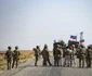 Soldați rusi si americani, prietenosi in Siria FOTO AFP 