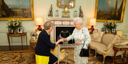 Queen Elizabeth II welcomes Theresa May