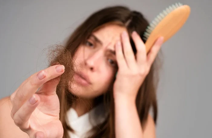 Cum să oprești căderea părului toamna.