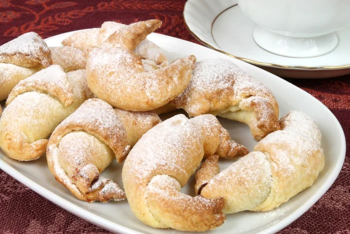 Home made sweet bakery Crescent rolls stuffed with plum jam jpeg