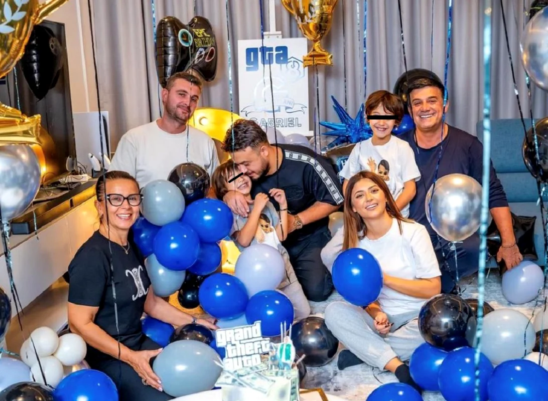 Ultima fotografie cu Niculae Bădălău în libertate, cu familia, la ziua nepotului