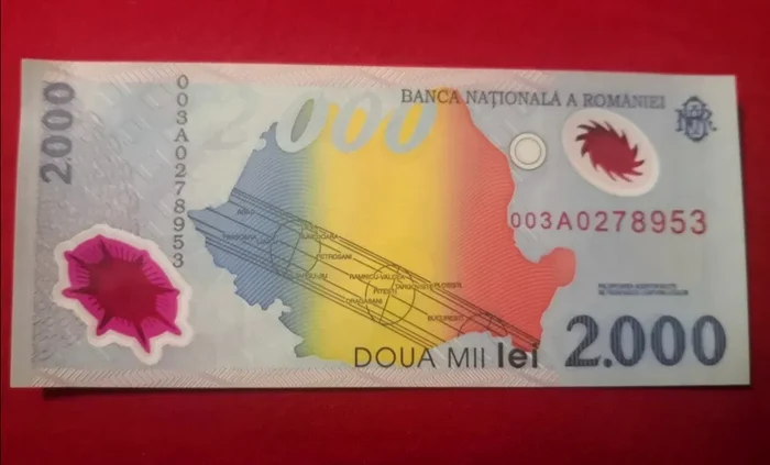 Bancnota de 2.000 de lei cu eclipsă se vinde cu 2.500 de euro! / Foto: Olx.ro