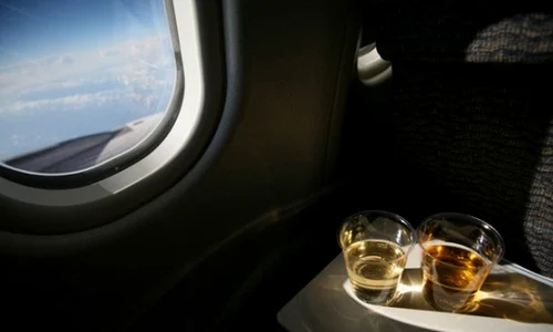 drinking on airplane 570x379 jpeg
