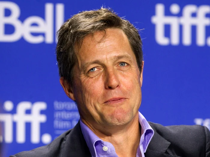 Hugh Grant recunoaşte că experienţa parentală l-a influenâat într-un mod pozitiv. FOTO Reuters