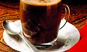 Steaming Hot Chocolate with Whipped Cream; Cinnamon Stick jpeg