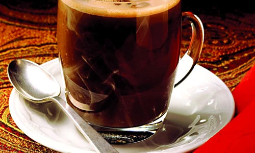 Steaming Hot Chocolate with Whipped Cream; Cinnamon Stick jpeg