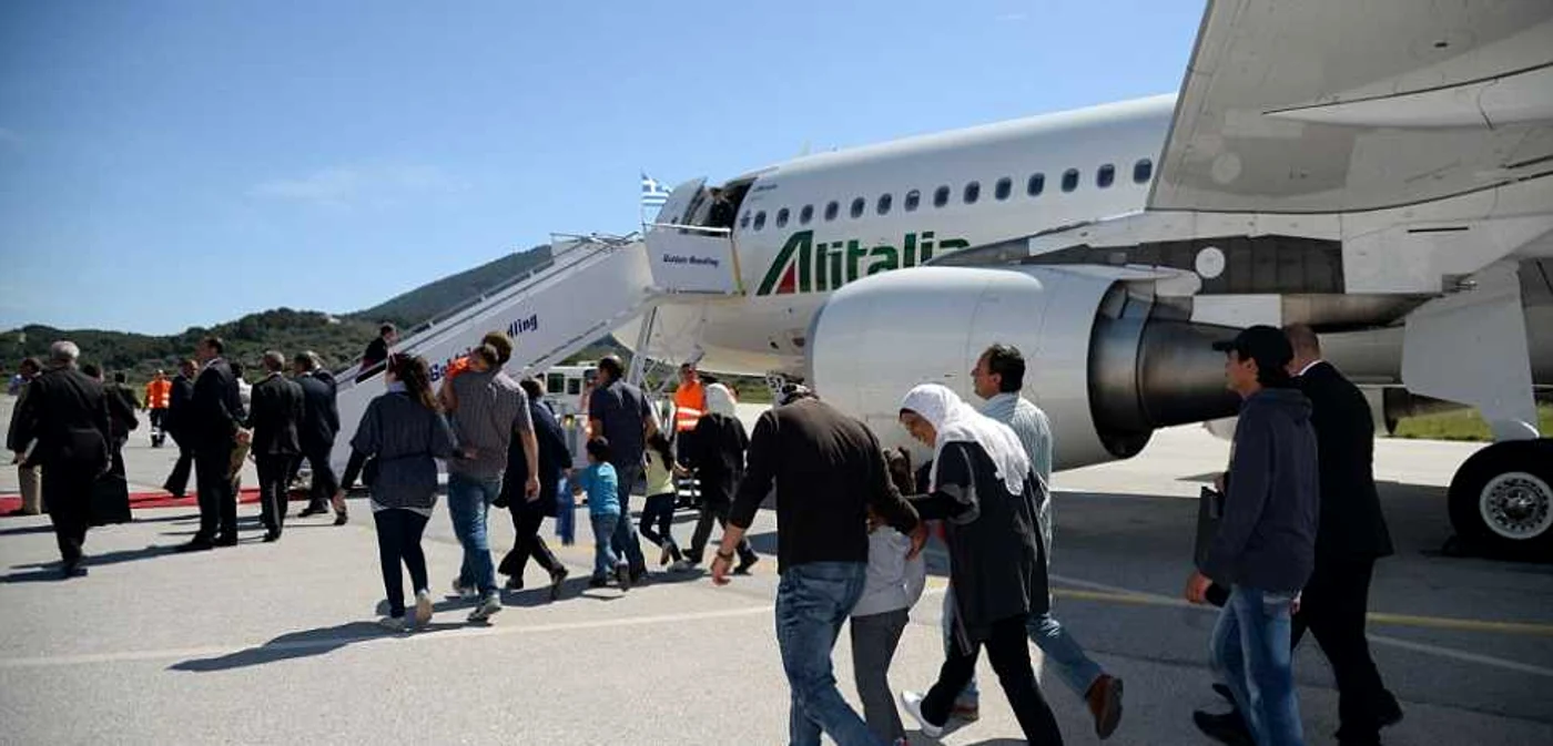 Refugiatii sirieni, la îmbarcarea în aeronava Papei