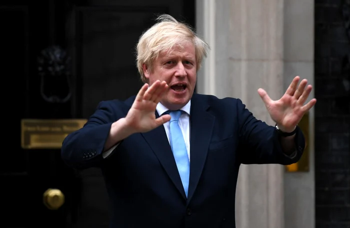 Premierul Marii Britanii, Boris Johnson, anunţă redeschiderea traptată a magazinelor. FOTO EPA-EFE / Neil Hall