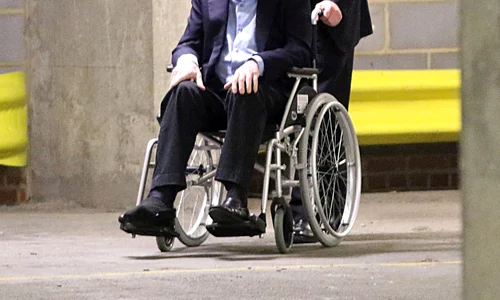 Exclusive: Sir Michael Caine spotted in a wheelchair jpeg