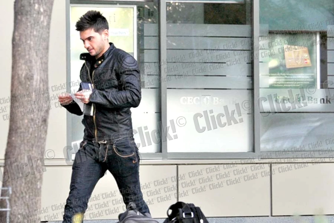 Dorian Popa s-a  bucurat să vadă  că prezintă interes  pentru paparazzi (Foto:Click!)