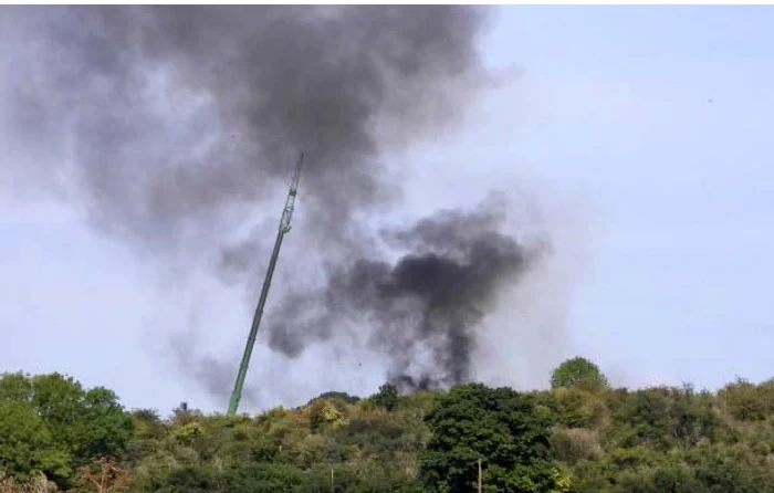 Fumul gros era irespirabil