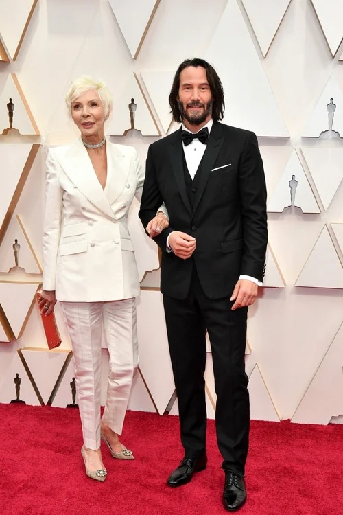 patricia taylor si keanu reeves au purtat costume dolce gabbana la gala oscar foto guliver getty images