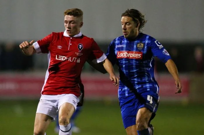 Alan Smith (dreapta) este mijlocaş în liga a treia din Anglia