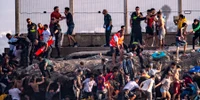 Sute de migranți au trecut din Maroc în enclava spaniolă Ceuta FOTO Profimedia