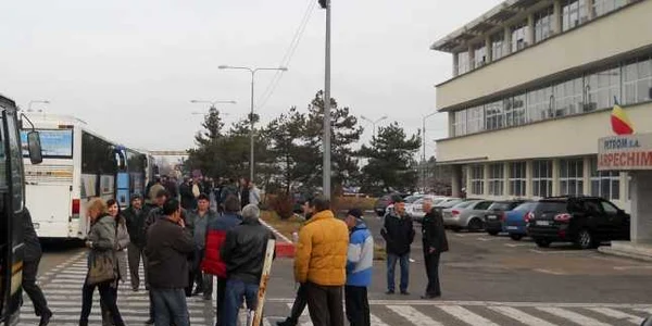 muncitori la autocare