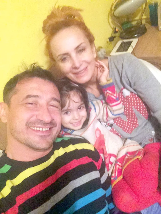 Daniela, George şi fetiţa lor, Maria