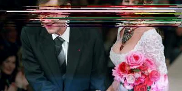 Yves Saint Laurent, alături de modelul său preferat, Laetitia Casta