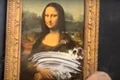 tablou mona lisa murdarit cu o prajitura 