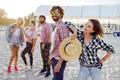 group happy friends spending amazing time together walking along sunny beach jpg