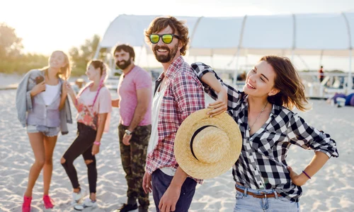 group happy friends spending amazing time together walking along sunny beach jpg