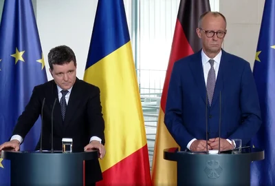 nicusor dan berlin merz  FOTO Captură video