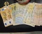 Banii găsiți în urma perchezițiilor/FOTO: Poliția Română