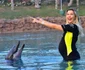 "Am adus și a treia burtică la delfini", a spus Emily Burghelea