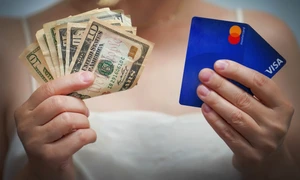 cash versus card - shutterstock 