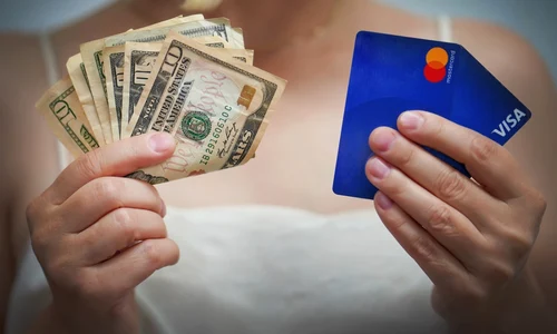 cash versus card - shutterstock 